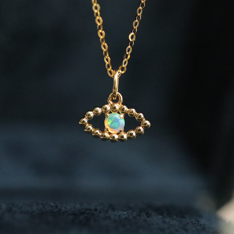 18K Yellow Gold Evil Eye charm necklace with Australian Opal Gemstone from Lollimix. 