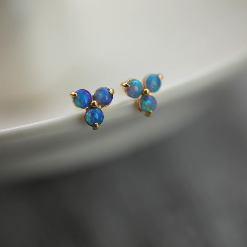 This pair of dainty stud earrings is made in solid 18K gold with genuine Australian opal gemstone, opal stone is October birth stone. 