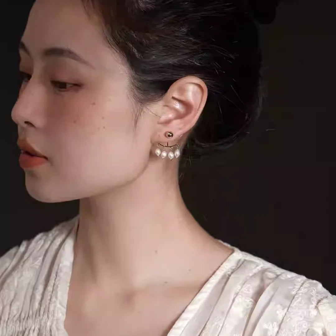Model wearing French style pearl ear jackets with S925 silver needle 1