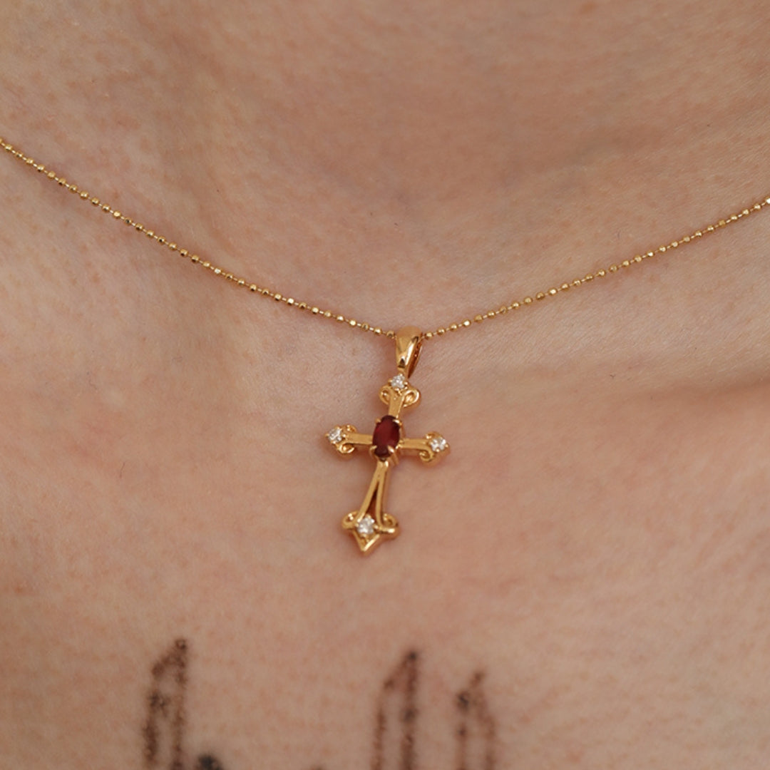 18K Gold Cross Pendant Necklace With Diamond on a person's neck On-Model Image 1