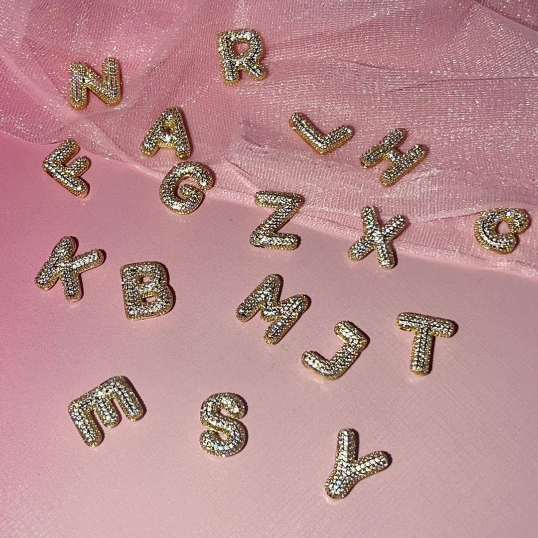Full set of custom bubble initial pendants in 18k gold with 5A CZ.