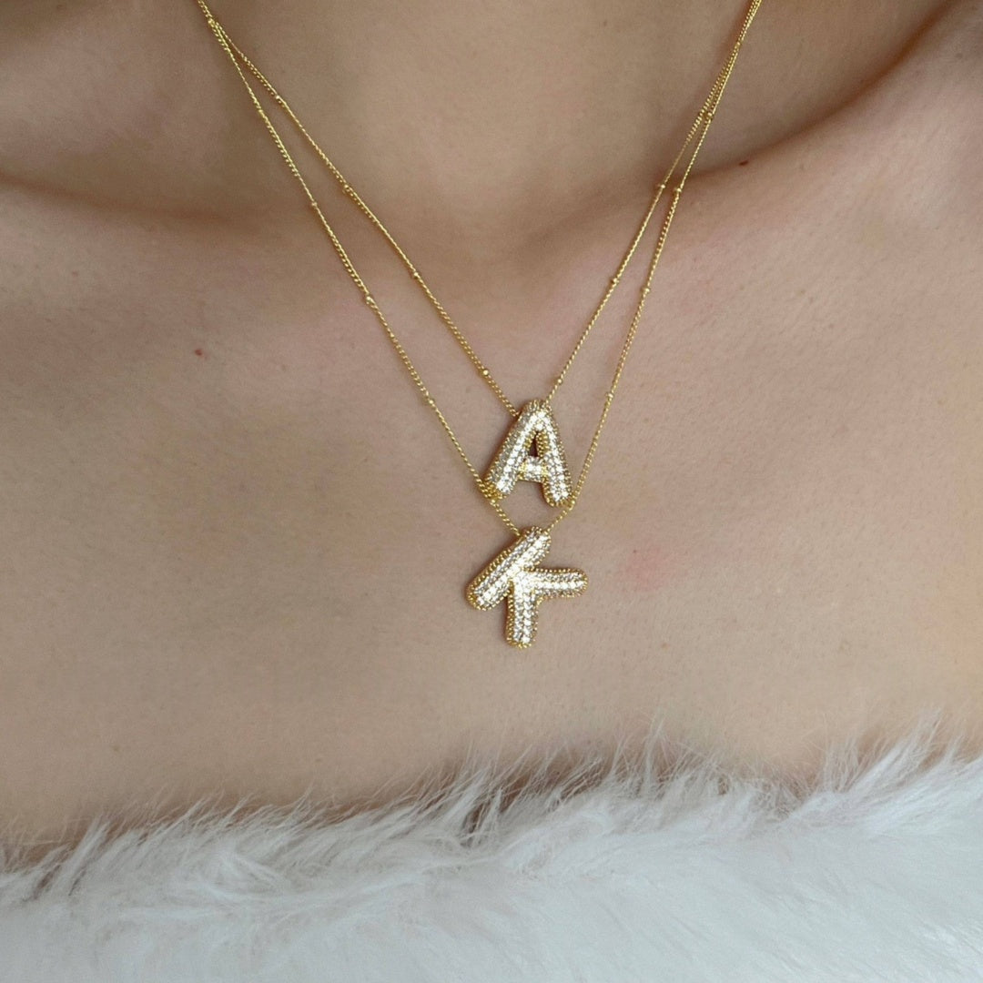 Custom A puffy bubble letter necklace in 18k gold plated copper.1