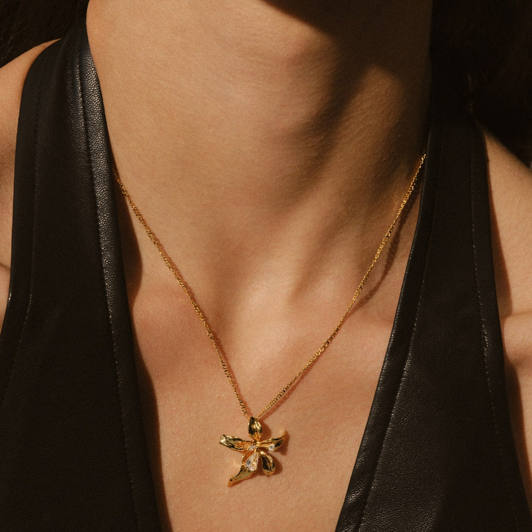 Close up of 3D lily blossom pendant with sparkling zirconia stones - close-up-1